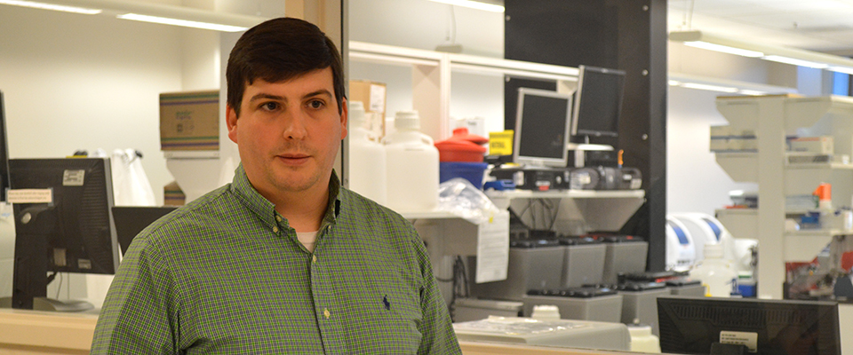 a DCLS employee discusses a laboratory