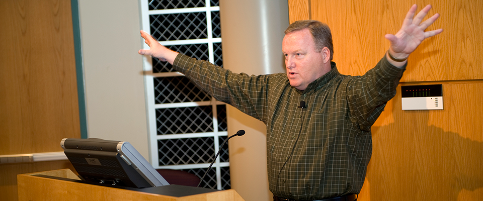 a professor at a podium